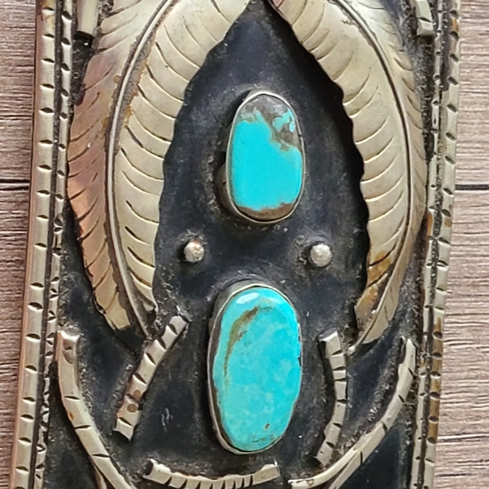 Native american buckle with two turquoise stones